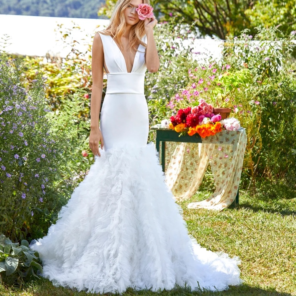 Deep V-Neck White Mermaid Wedding Dress with Feathered Skirt